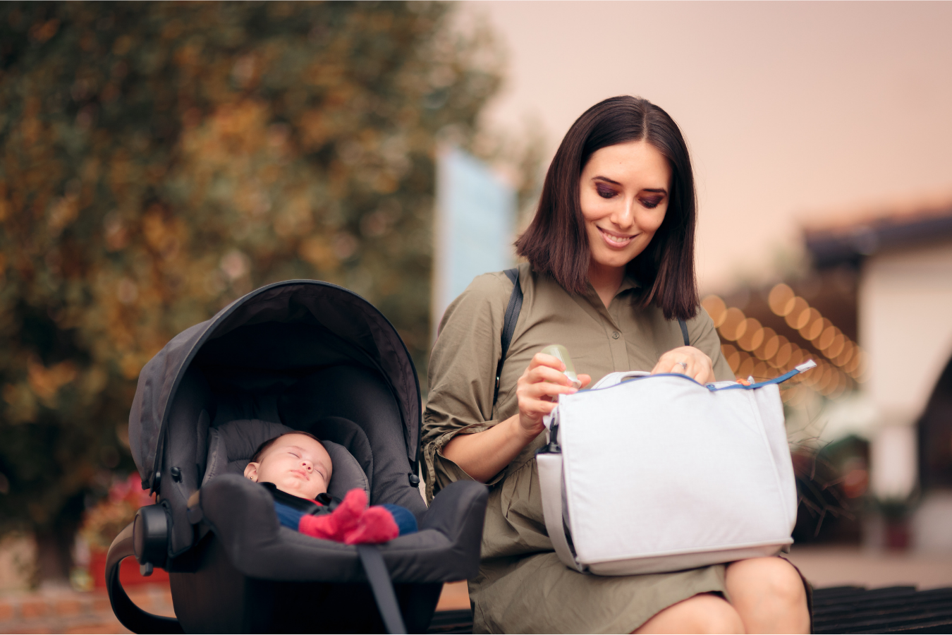 woman with baby in stroller-laws for breastfeeding mothers-Mila's Keeper