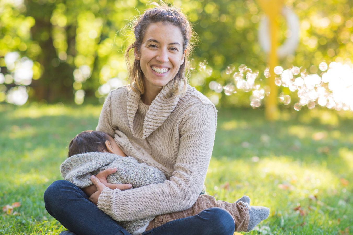 woman holding baby-breastfeeding in public laws-Mia's Keeper