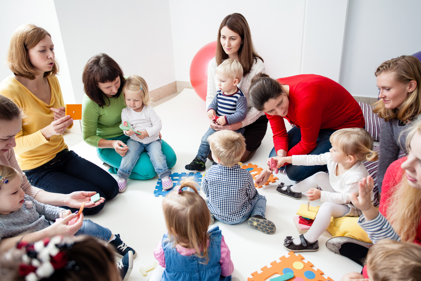 moms and babies playing- breastfeeding strike- Mila's Keeper