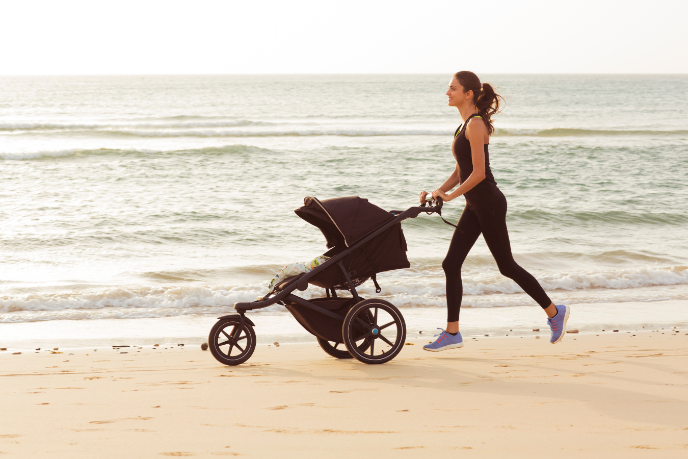 woman jogging with baby-weaning breastfeeding-Mila's Keeper
