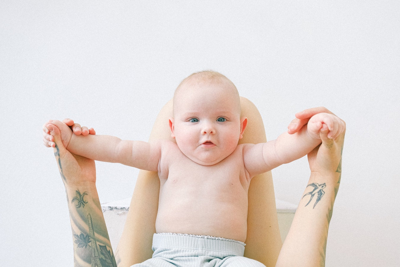 baby in lap/can-you-get-a-tatoo-while-breastfeeding