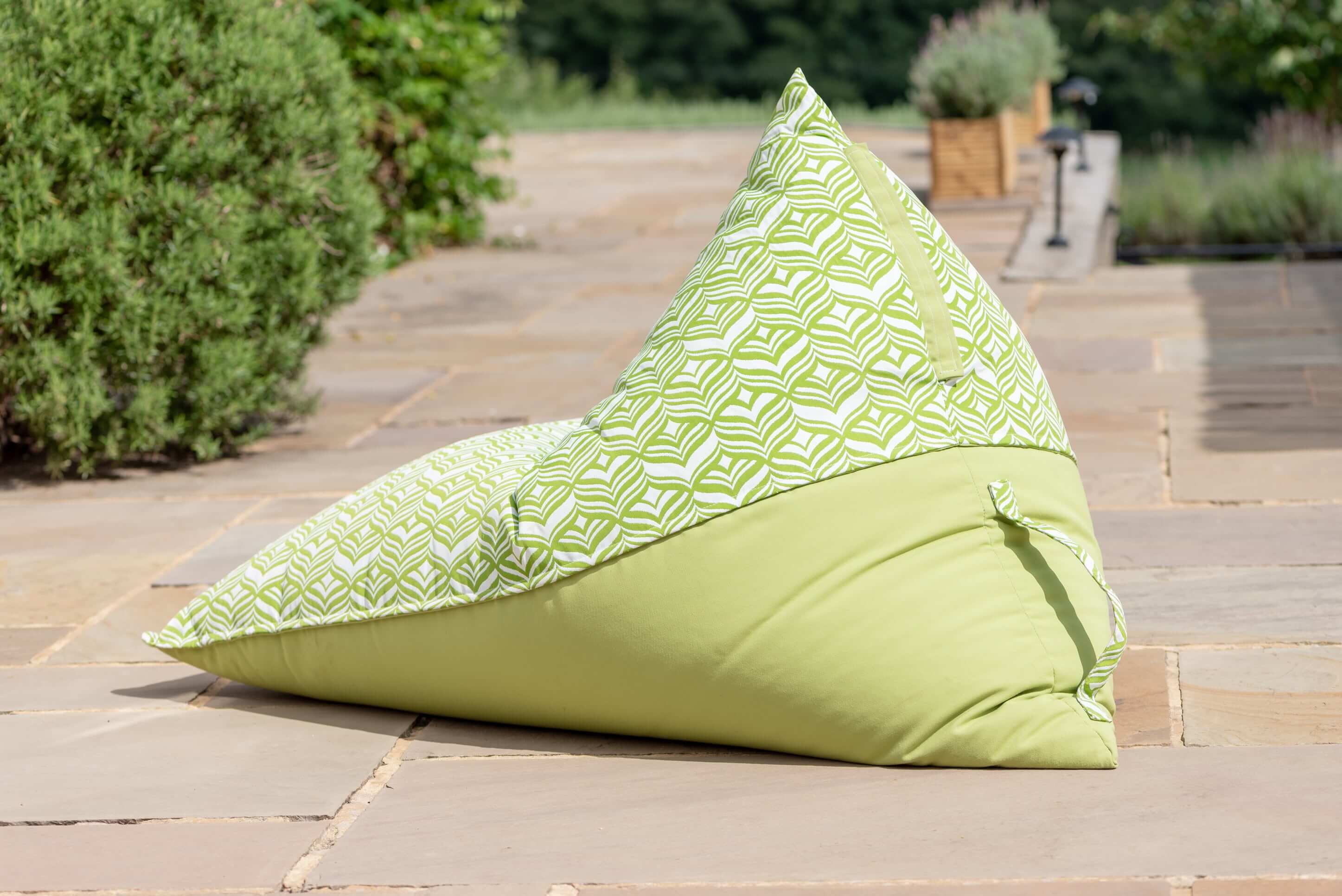 Lime Green outdoor bean bag lounger sat invitingly on the graden patio in the glorious sunshine