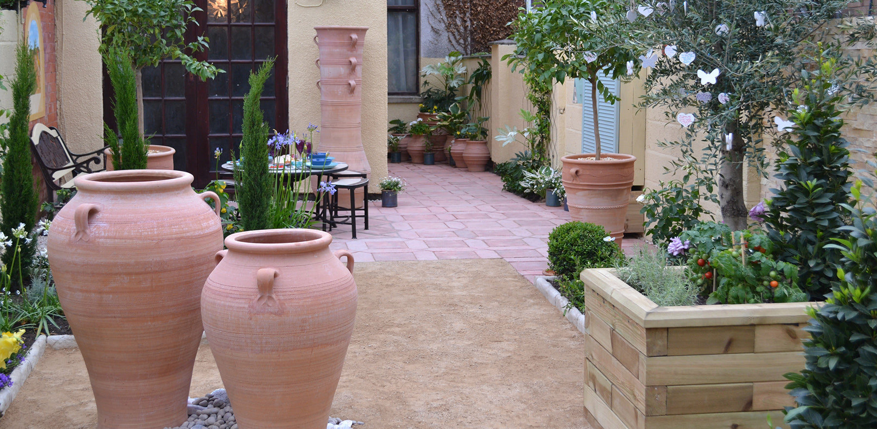 Terracotta pots add a mediterranean twist to a garden