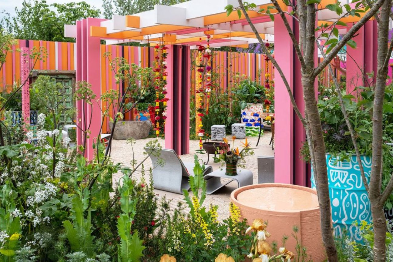 The RHS and Eastern Eye Garden of Unity with a bol and bright fence in orange and pink stripes