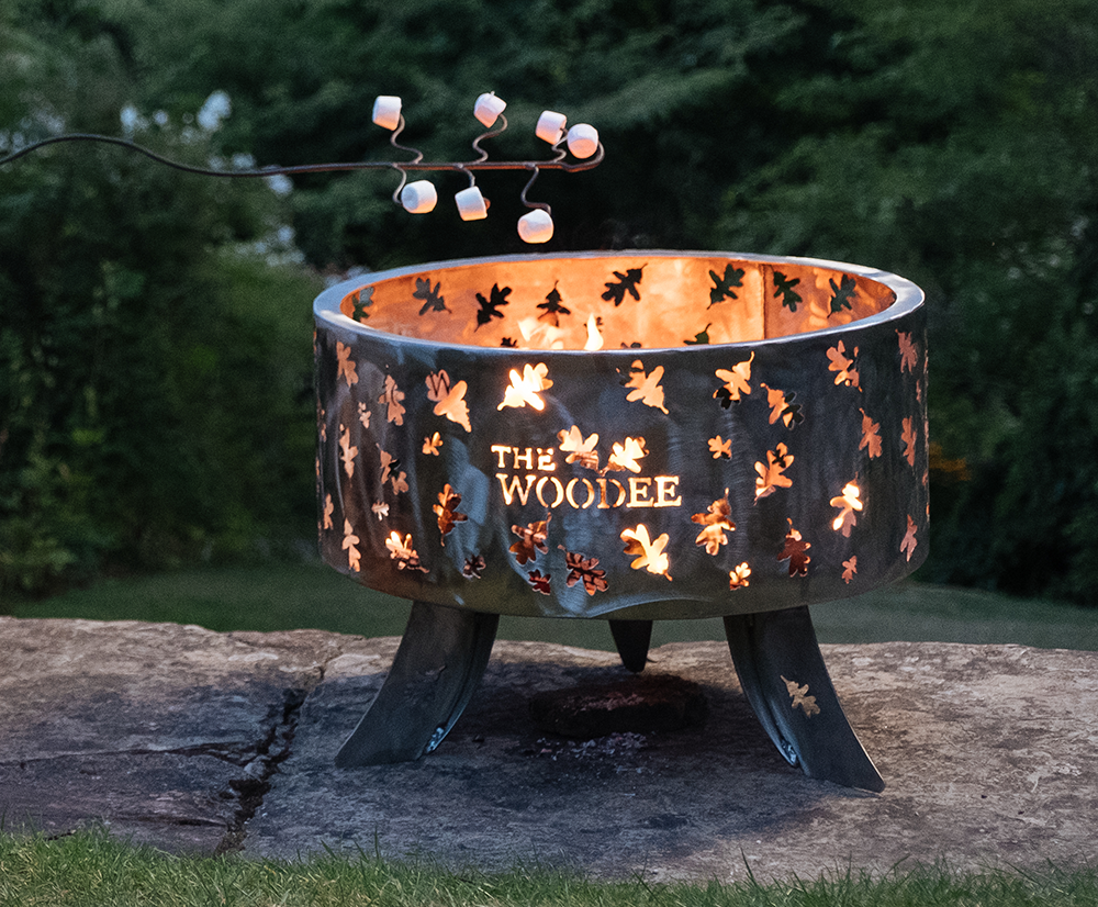 A beautiful Woodee fire pit with marshmallows ready to toast
