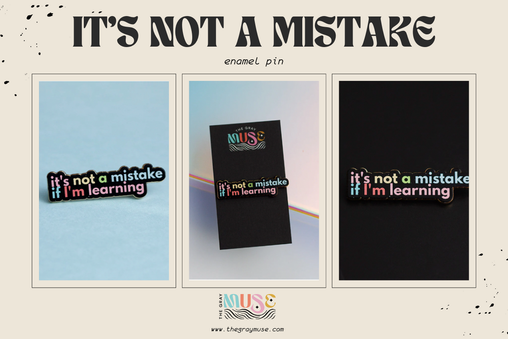 its not a mistake text enamel pin by the gray muse