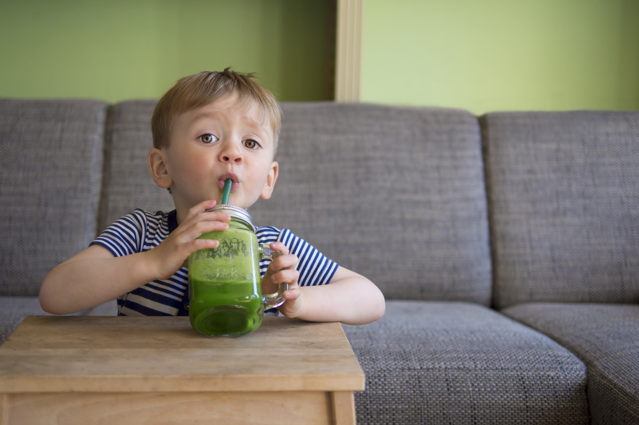 best foods for sick kids by illness - spinach/banana smoothie and leafy greens for aches and pain