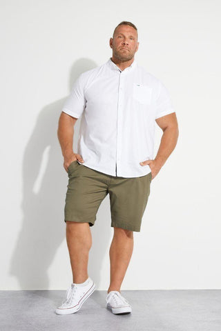 White sneaker + shorts + a button-down blouse