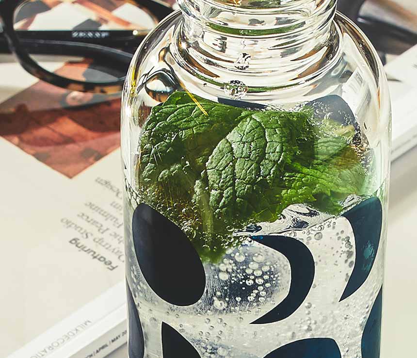 TOTAL ECLIPSE INK GLASS WATER BOTTLE: DANICA STUDIO