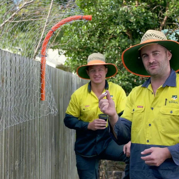 Men building a fence