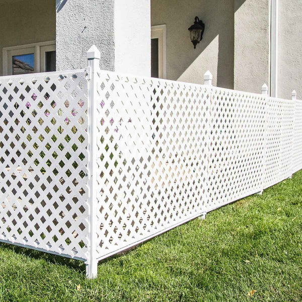 A white fence around a house