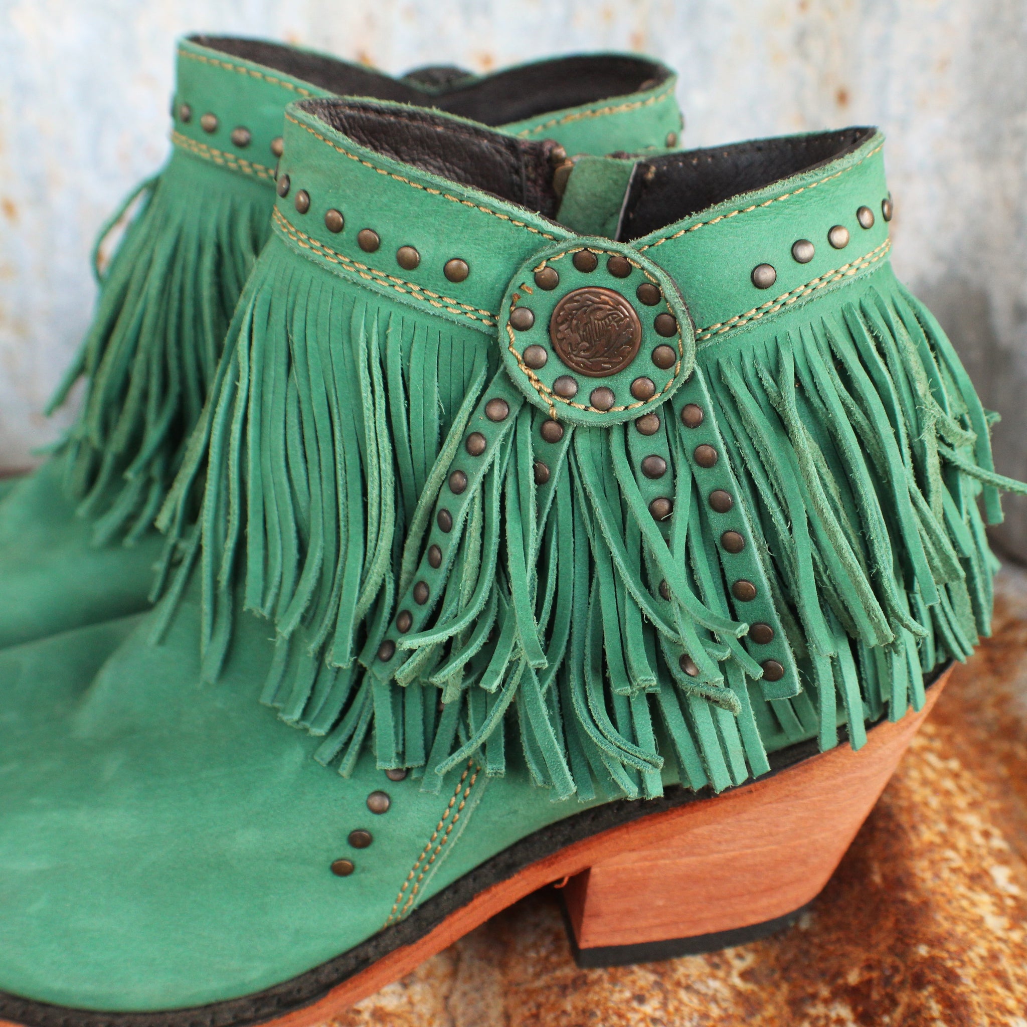 turquoise booties with fringe