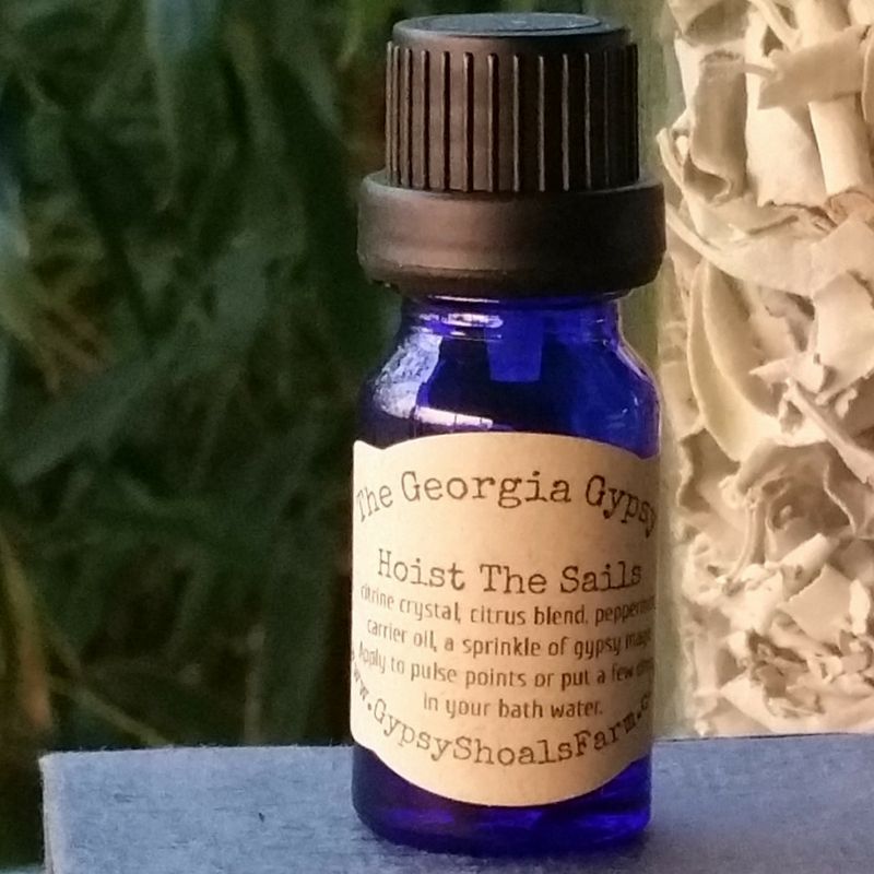 Hoist the Sails georgia gypsy crystal infused energy reiki charged energizing essential therapeutic oil