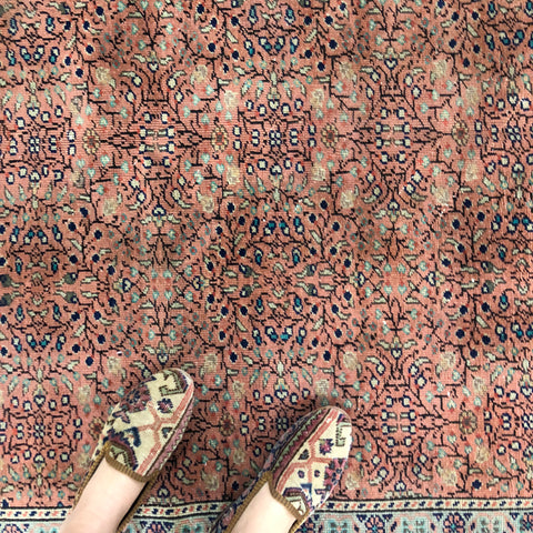 Oriental carpet shoes on oriental carpet