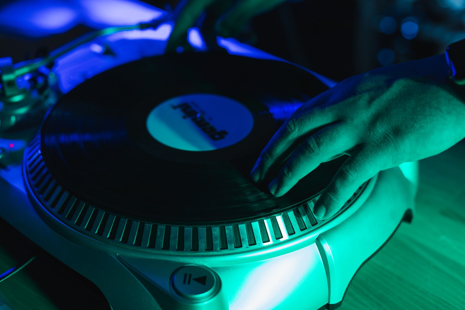 DJ mixing music with a turntable