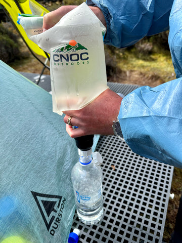 filtering water with a cnoc and sawyer squeeze