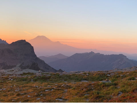 Mt. Rainier from our campsite through the gloaming, with the back side of Goat Rocks citadel in the foreground