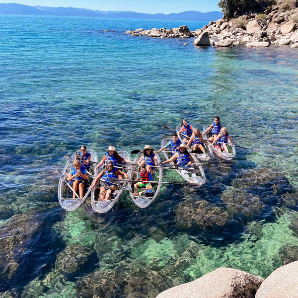 the kyte baby team and creators on a clear kayak tour in lake tahoe