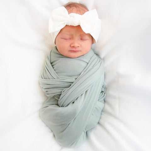 when should  you stop swaddling your baby