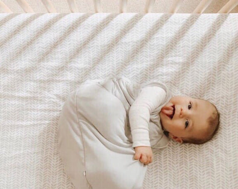 What should my baby wear under the sleep sack?