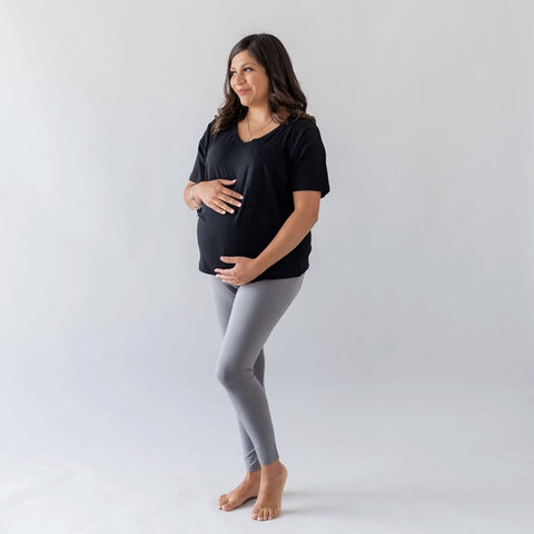 pregnant woman wearing kyte baby relaxed fit v neck