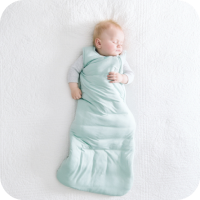 Baby asleep wearing a Kyte sleep bag