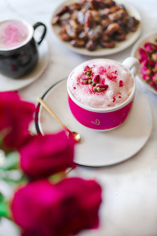 Pink Rose Latte made with LIVA Date Syrup, in a pink cup
