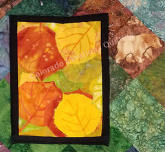 Snapshots of Colorado quilt by Jackie Vujcich features image of aspen leaves