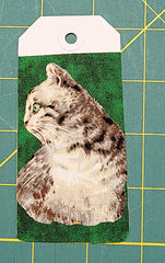 cat fabric fused to right side of gift tag