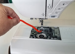 pipe-cleaner-cleaning-bobbin-area-of-sewing-machine1