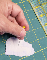 score fusible web using a sharp object like a pin