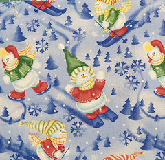 seasonal cotton fabric with snowmen skiing