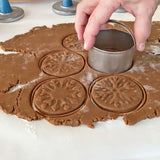cutting circles of stamped gingerbread