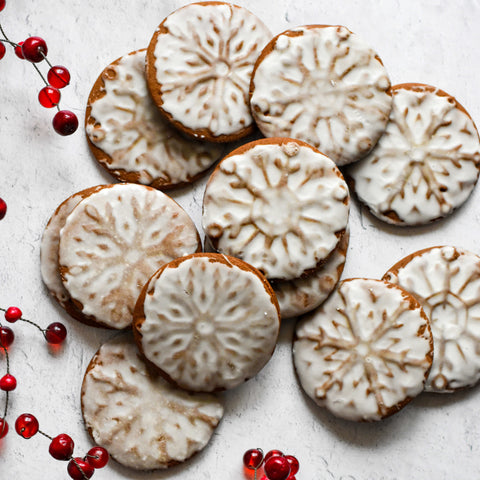 snowflake stamped and glazed gingerbread cookies overhead