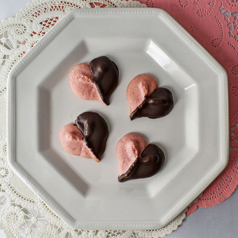 strawberry spritz heart cookies dipped in chocolate