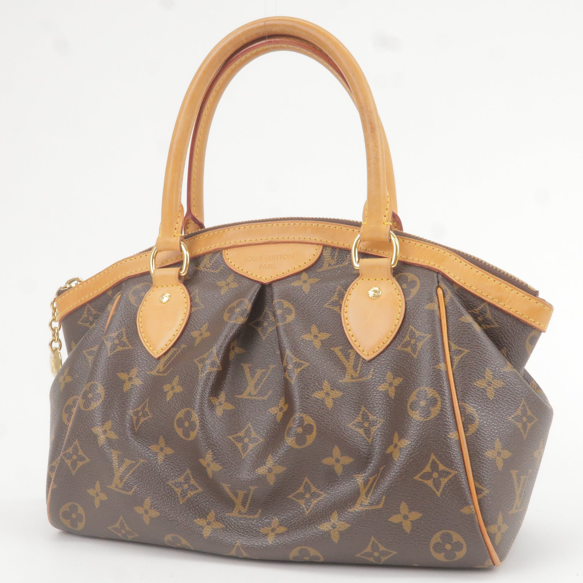 Sold at Auction: AUTHENTIC LOUIS VUITTON TIVOLI GM MONOGRAM CANVAS LEATHER  HAND BAG