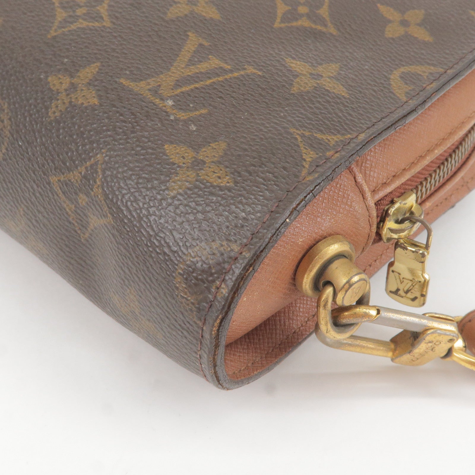 Louis Vuitton Orsay Canvas Clutch Bag (pre-owned) in Brown