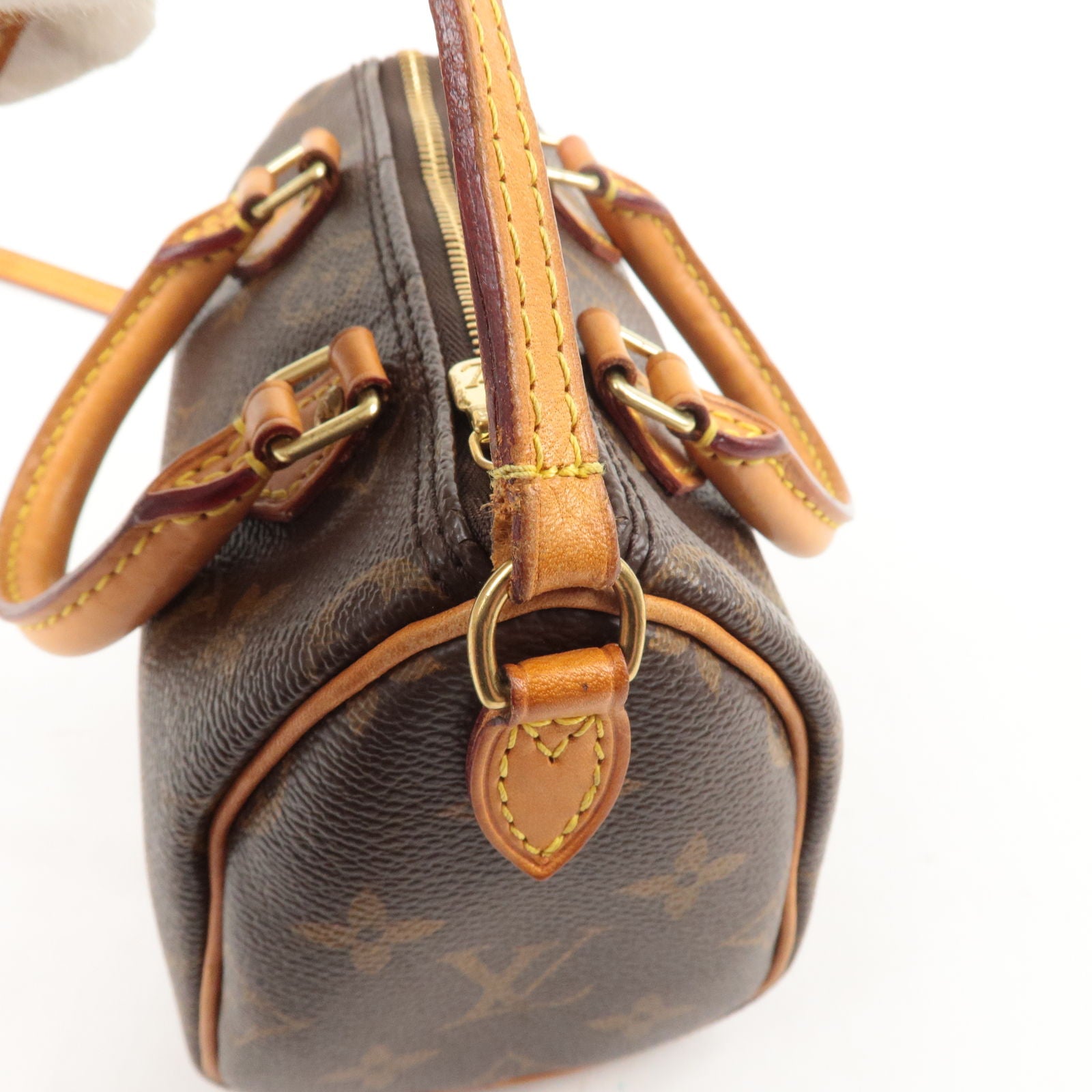 LOUIS VUITTON Petite pochette en cuir et toile monogramm…