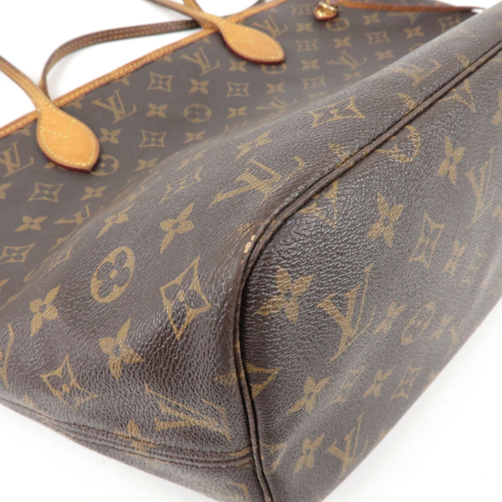 Incantevole trousse Louis Vuitton in tela monogram nera e pelle