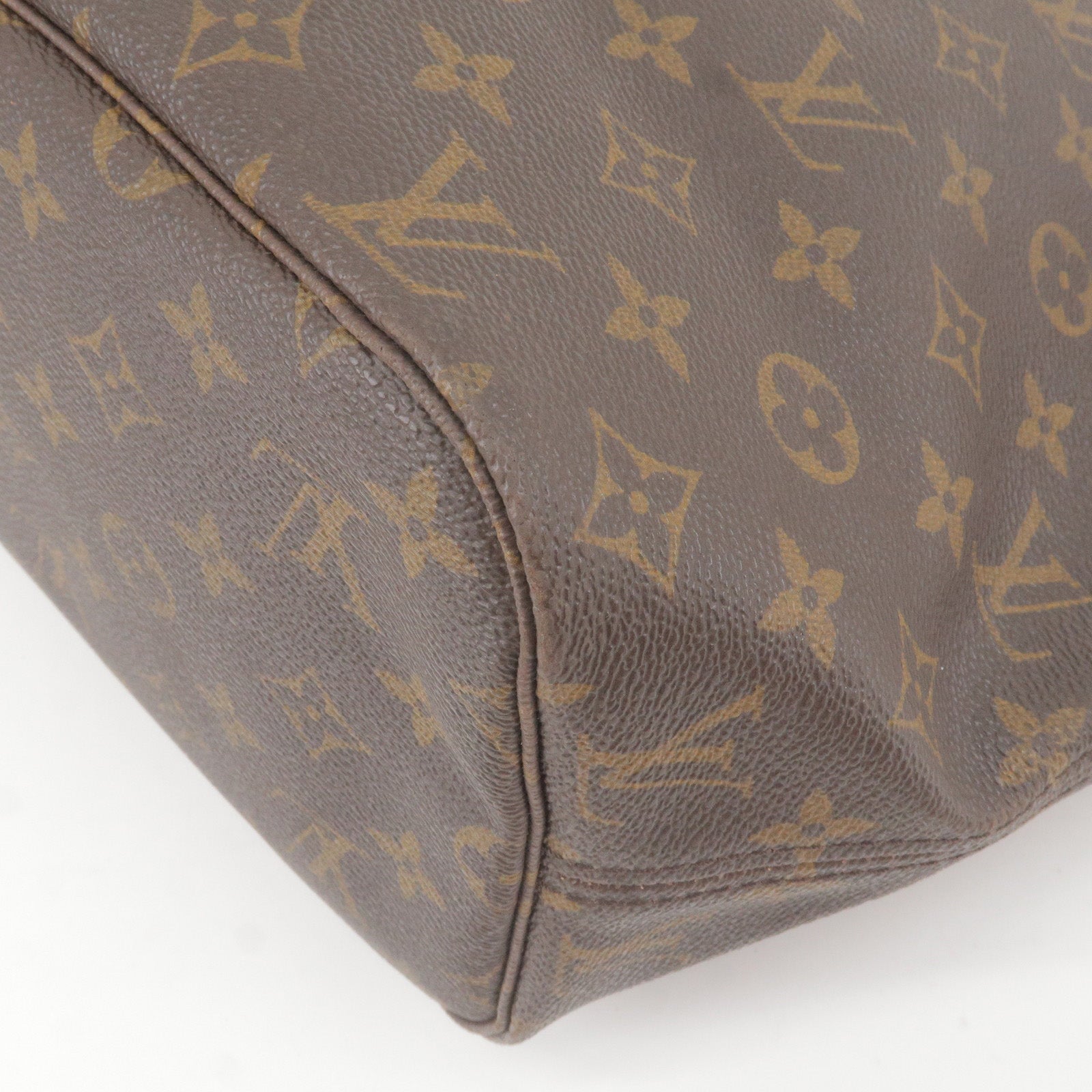 Louis Vuitton Flanerie in monogram canvas and natural leather