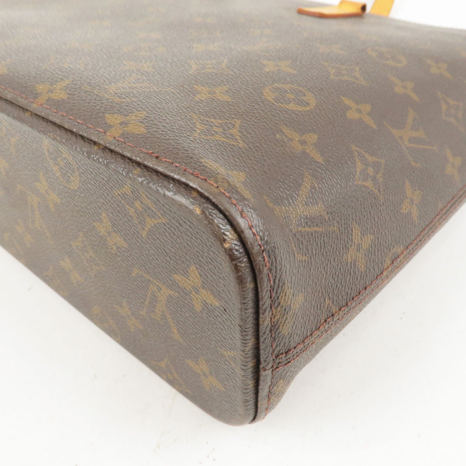 Louis Vuitton Lockit Handbag in Brown Monogram Canvas and Natural