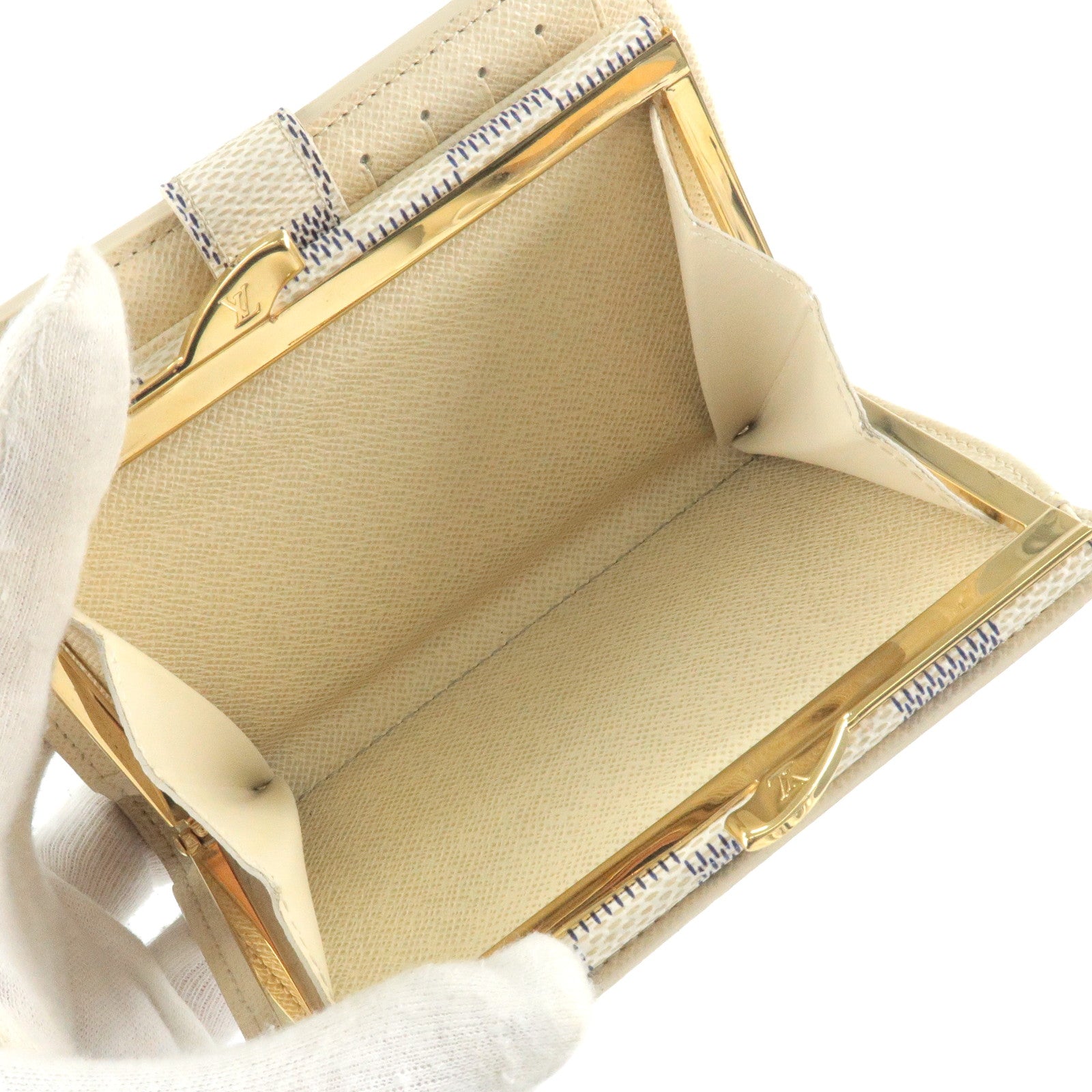 Sold at Auction: (2 Pc) Vintage Louis Vuitton Keychain & Bifold Wallet Set