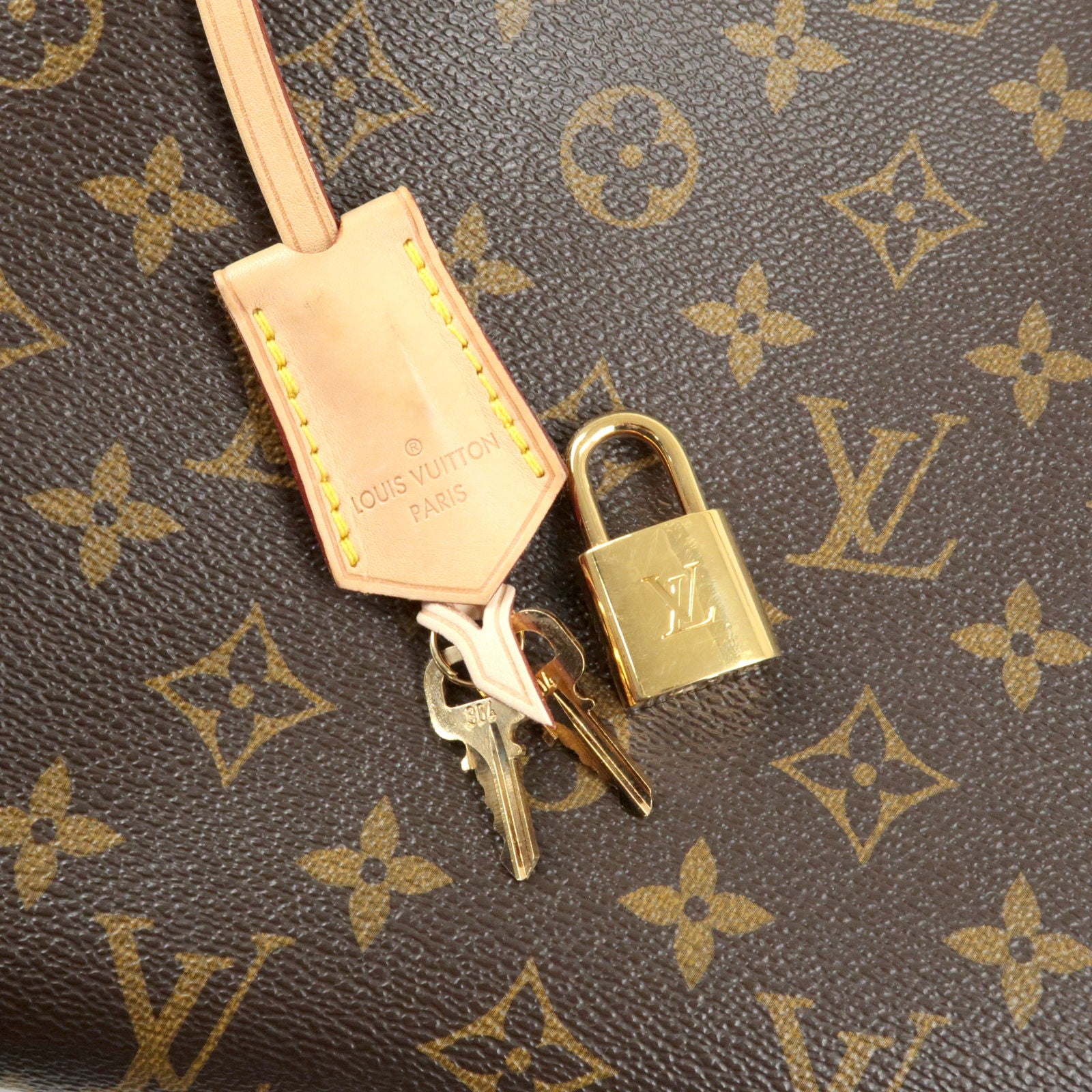 Buy Pre-Owned LOUIS VUITTON Lock Wallet Flower Monogram