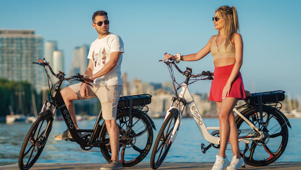 Couple Riding Emmo Vgo Pro 2.0 Step-Thru Ebikes