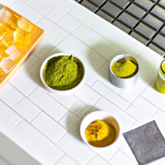 matcha tumeric and ice cubes in a kitchen