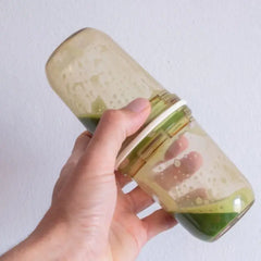 shaker jar with matcha in it