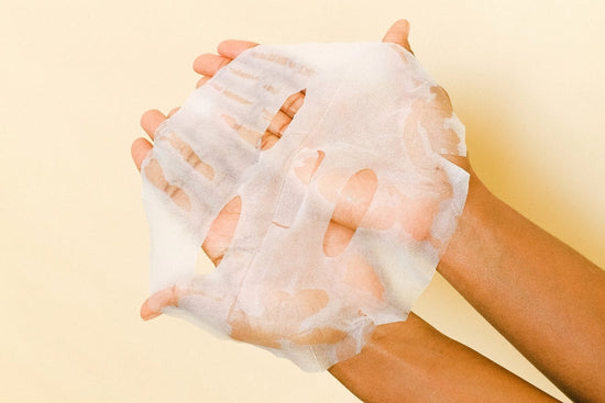 Sheet mask being held in two hands