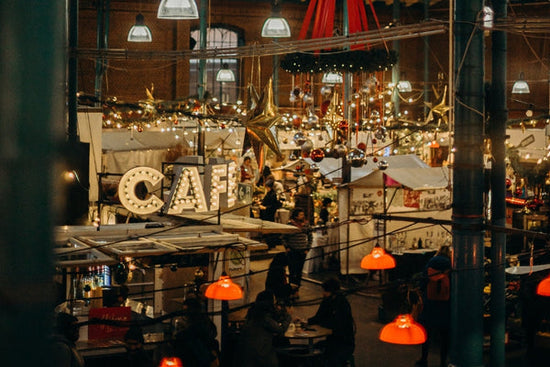 picture of winter market with many string lights