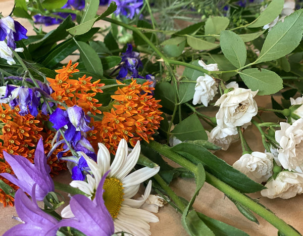 A bunch of fresh cut flowers on a table