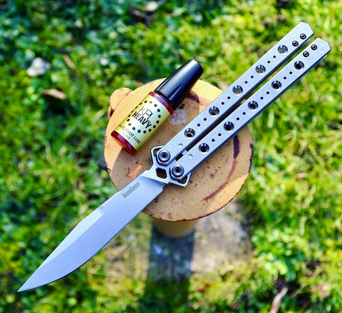 Use Knife Pivot Lube as the best butterfly knife oil